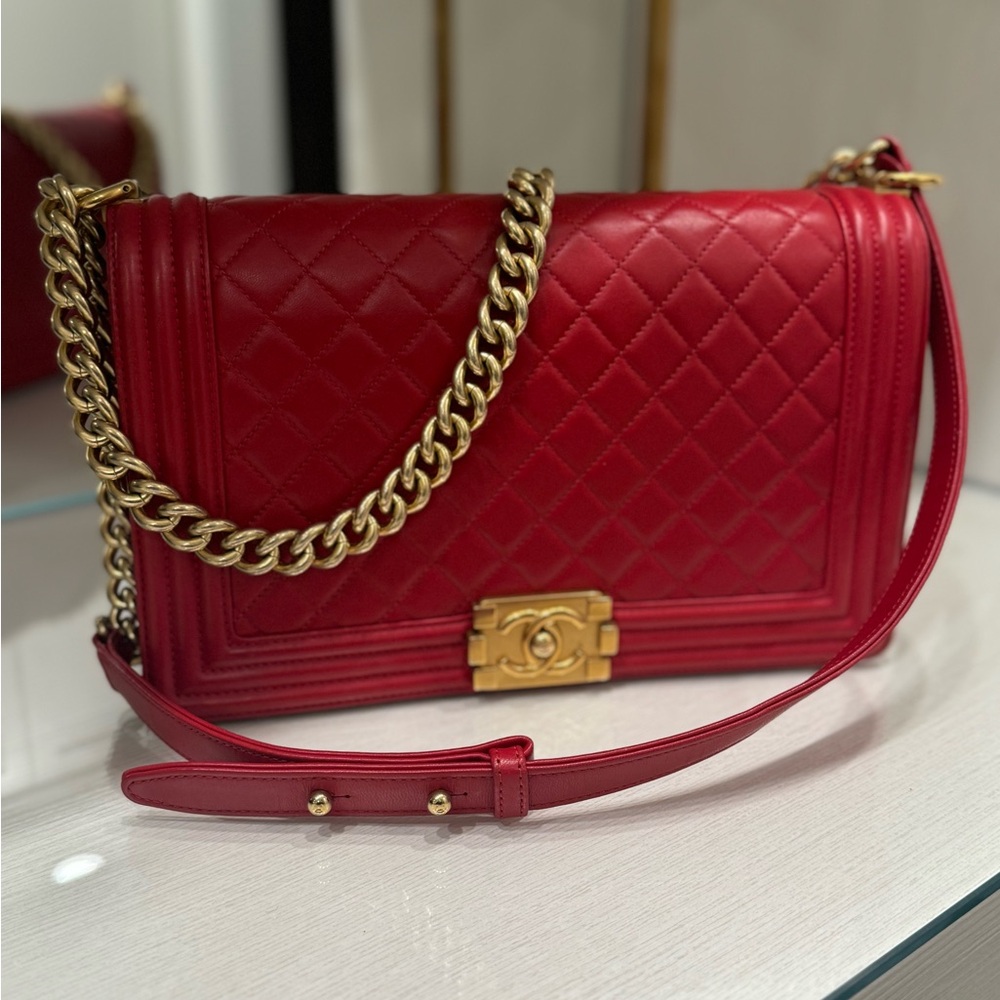 Authentic CHANEL BOY Red W Gold hardware.